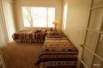 Guest bedroom offers twin beds